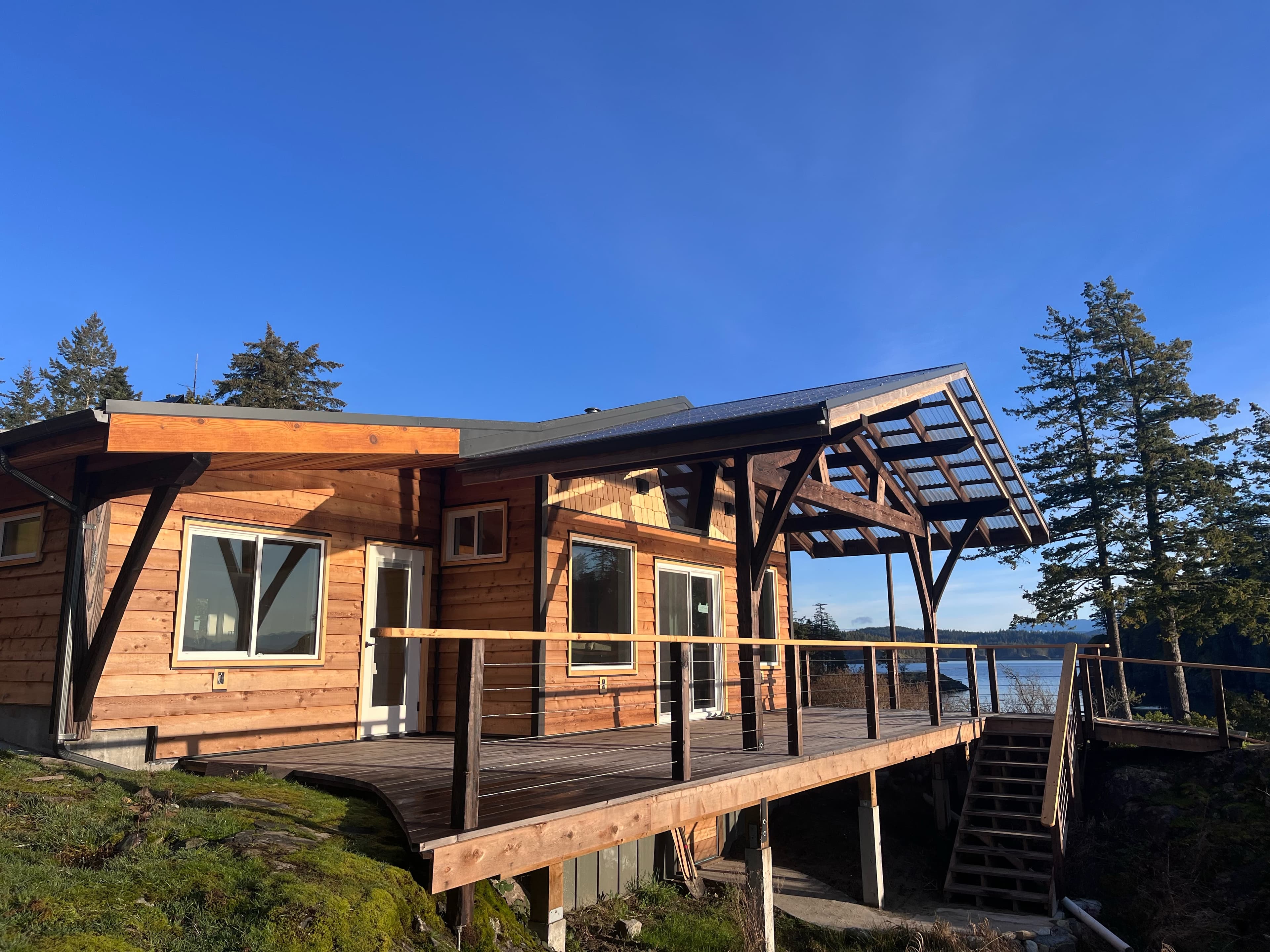 Completed timber frame structure with crisp joinery details