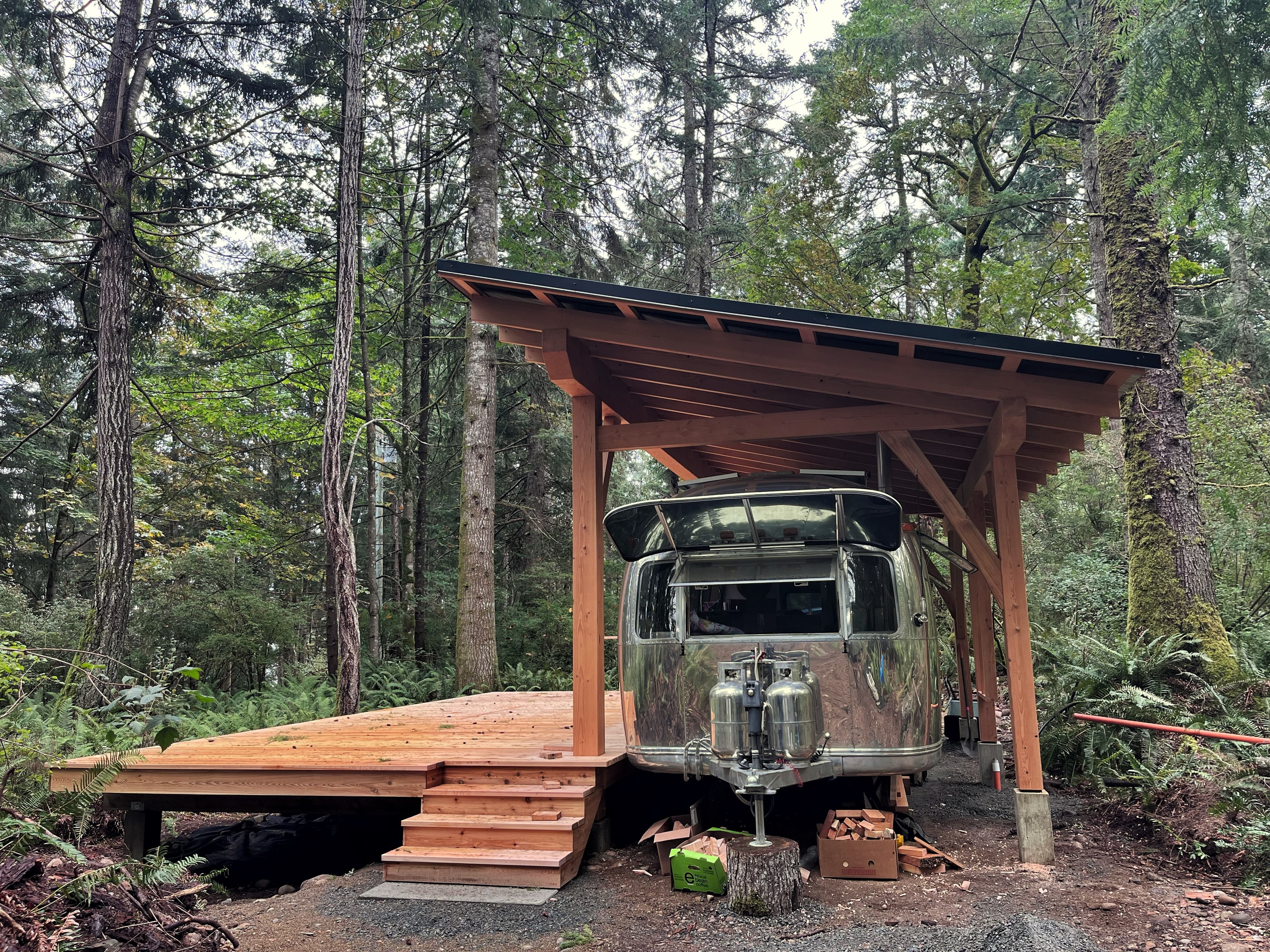 Wood structure set into coastal landscape
